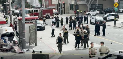 1 killed, 4 injured in SF bus stop crash involving carjacked vehicle